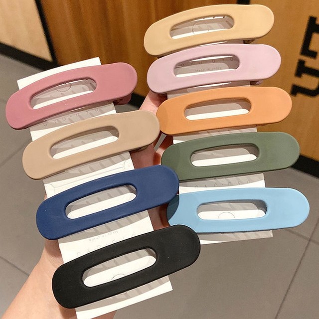 
1 random colored large bangs with a duckbill clip