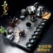 bàn trà sắt sơn tĩnh điện Bộ ấm trà Kung Fu hoàn chỉnh, khay trà đá vàng đen tại nhà, bàn trà đá phun nước chảy nguyên tử, nước sôi đơn giản, hoàn toàn tự động bán bàn trà điện