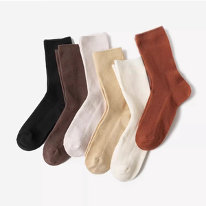 Women's high -tube socks pile socks elastic pits sock socks pure color knitted socks simple plain wind versatile cotton socks
