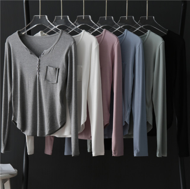 Mao -edge pocket arc swinging long -sleeved T -shirt female summer 2025 new slim round neck thread cotton bottom shirt