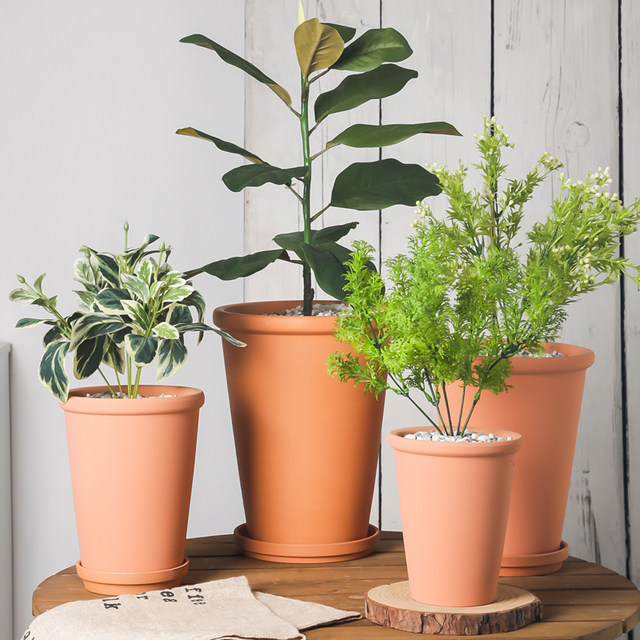Red pottery flower pot thin edges and thin round pottery bamboo, kapok leaves, juanhua green plants clay breathable pot special price

