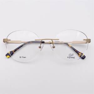 
Foreign trade original Japanese order gold alloy business temperament frameless large round frame literary and artistic plain-faced glasses frame for men and women