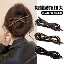 Elegant Leather Bow Hairpin Bobby Pin for Women 2025 New High-End Leopard Print Twist Clip for the Back of the Head