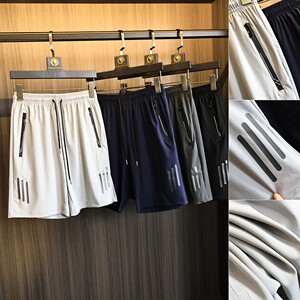 
Glue pressed zipper + classic slash printing 2025 summer men's outdoor high elastic texture sports and casual shorts