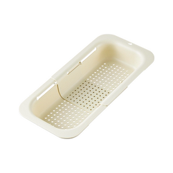 Hollow telescopic drain basket at the bottom of the house