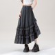 Black elastic waist ruffled spliced ​​denim skirt for women in summer new small irregular A-line long skirt