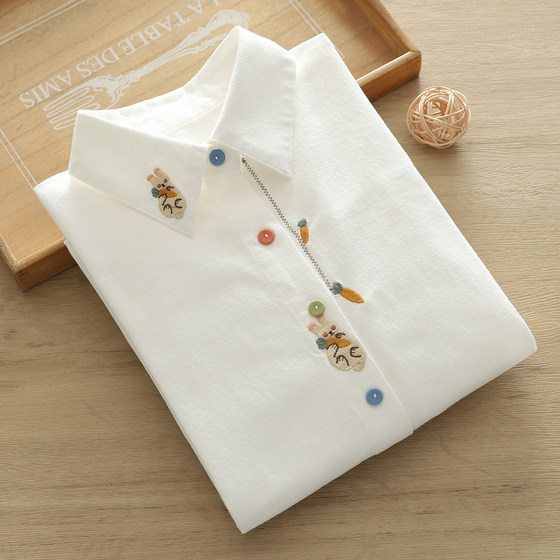 
Literary and fresh cartoon embroidered rabbit carrot color buttoned shoulder-wisted white shirt women's long-sleeved base shirt trendy