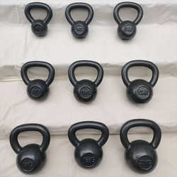 Sports solid kettlebell slimming kettle dumbbell men and women home slimming squat buttock shaping training kettlebell wholesale