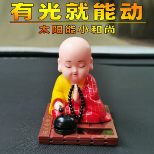 Solar energy nods the wooden fish little monk car small ornament car cute little sandy doll center console
