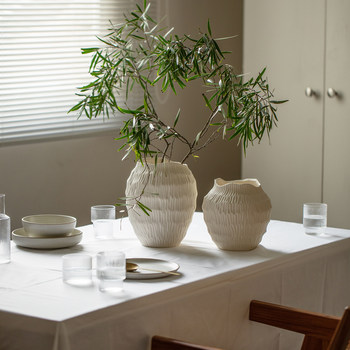 Wabi-sabi style white stoneware jar Nordic Danish designer ceramic vase ornaments B&B tea room hotel reservation