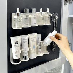 Wall-mounted storage rack behind mirror cabinet door