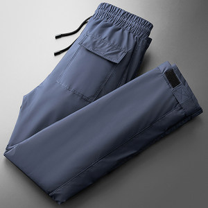 Winter outdoor waterproof, cold -proof and warm white duck pants, men loose waist magic sticks straight down pants outside