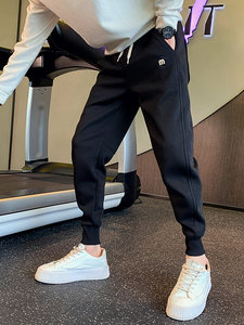 
Trendy and versatile black casual pants for men in spring and autumn new slim fit harem nine-point sports pants for men