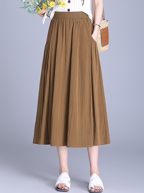 Asymmetric casual skirt Comfortable loose skirt 2025 summer new high-waist A-line skirt mid-length pocket skirt