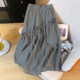 Retro black and white plaid black earring skirt for women in summer irregular A-line thin casual high-waisted long skirt
