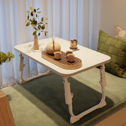 Small bed table that can be raised and lowered for home use in dormitories with bay windows