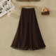 Retro corduroy skirt for women in autumn and winter new high-waisted slim button decorative tassel large a-line sling umbrella skirt