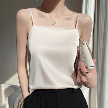 
Women's white suit with small suspender vest