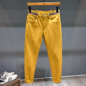 
High-end light luxury yellow nine-point jeans for men, handsome slim-fitting pants, casual and versatile long pants with ribbon decoration