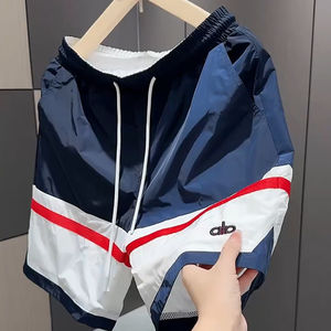 
European-style summer men's sports shorts design color-blocking casual five-point pants beach pants loose straight and handsome