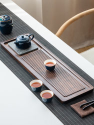 Whole solid wood tea tray household drainage dry tea table Japanese rectangular black gold stone tray Kung Fu tea set tea sea