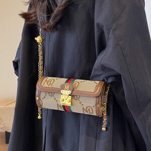 
High-end bags for women 2026 new trendy fashion niche shoulder bag Internet celebrity hot style chain crossbody cylinder bag