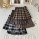 Large size grid JK pleated skirt female autumn and winter fat MM high -waisted half -body skirt A -line skirt college style short puff skirt
