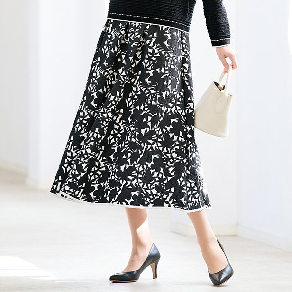 2025 spring and summer Japanese purchasing jacquard fabric surface concave and convex shadow floral pattern flared skirt with large size
