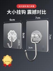 Stainless steel hooks are attached to strong wall adhesive hooks