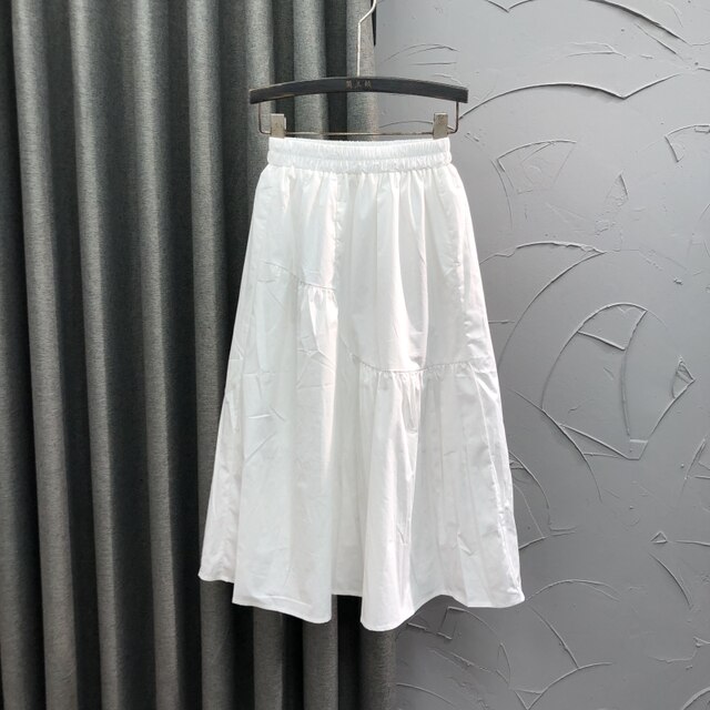 Korean style white elastic waist casual splicing skirt for women in summer fashion loose and fashionable A-line large sway midi skirt