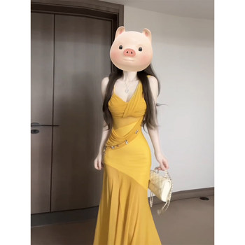 A slightly fat French holiday style yellow mesh suspender skirt
