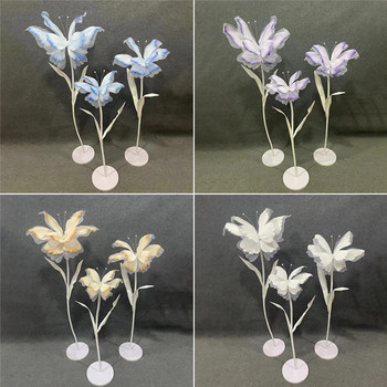 
Silk Road Yin floral wedding stage background wall decoration outdoor window display three-dimensional simulated butterfly pole flower