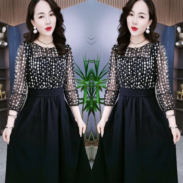 2025 early spring new style slim waist-hugging spliced ​​printed round neck mid-length skirt