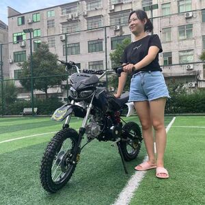Two wheeled off-road motorcycle fuel powered vehicle 125 mountain bike track, men's small road sports car in the middle and high school races