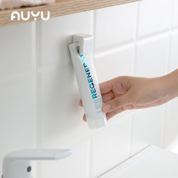 Anyu Bathroom Hanging Toothpaste Holder Wall-Mounted Facial Cleanser and Skincare Product Rack No-Drill Wall Storage
