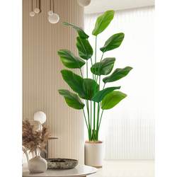 Scandinavian style artificial green plant cigar, arrowhead traveler banana indoor floor standing person