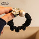 Chuzhimo camellia pearl hair rope 2025 new temperament sweet ball hair rope high appearance small intestine circle