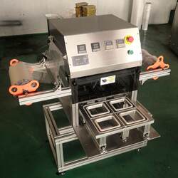 Sauce box automatic sealing machine plastic barrel sealing machine juice yogurt cup fully automatic cup sealing machine packaging