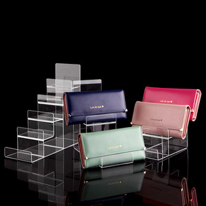 
Acrylic widened trapezoidal wallet rack multi-layer display rack transparent handbag glasses jewelry storage rack