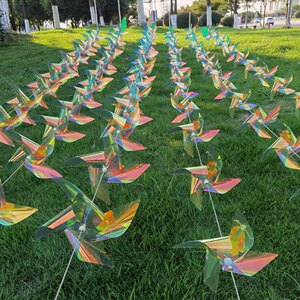 
Transparent color film colorful windmill string outdoor decoration kindergarten hanging ornaments real estate plastic rainproof scenic area four-corner windmill