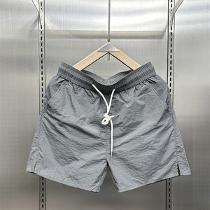 Summer thin ice silk fast dry shorts men's 2024 tide brand casual triple pants couple drawing rope solid color beach pants