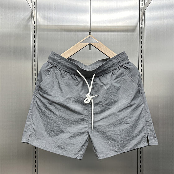 Summer thin ice silk fast dry shorts men's 2024 tide brand casual triple pants couple drawing rope solid color beach pants