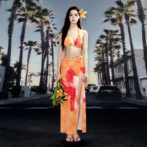 
Rocayi's new orange printed island vacation sexy bikini long skirt looks slim and gathers hot spring split swimsuit