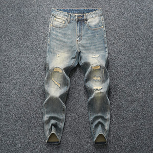 
Autumn and winter original high-end fashion brand jeans men's slim fit small feet retro hole patch beggar pants men's trendy stretch