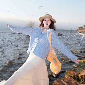 
Korean style lazy style hollow knitted cardigan with sweet and cute buttons to show temperament, loose and slim sweater jacket