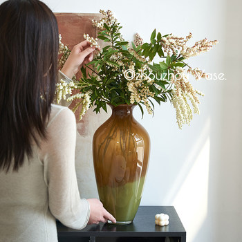 Middle-aged handmade glass vase retro brown green
