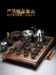 Tao Fuqi hộ gia đình lười biếng bộ ấm trà tích hợp khay trà cát tím tự động ấm trà ấm trà gỗ nguyên khối bộ bàn trà bộ pha trà điện Bàn trà điện