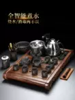Tao Fuqi hộ gia đình lười biếng bộ ấm trà tích hợp khay trà cát tím tự động ấm trà ấm trà gỗ nguyên khối bộ bàn trà bộ pha trà điện Bàn trà điện