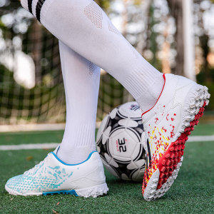 Magic post children's football shoes broken nail non -slip artificial grassland Messi long nail male and female students training football shoes

