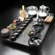 bộ bàn trà điện thông minh Khay trà Zhongdi hoàn toàn tự động Bộ bếp cảm ứng đáy kính một mảnh phòng khách nhà bộ trà Kung Fu bàn trà điện mini